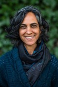 Michelle Mascarenhas, an Indian woman, smiles at the camera